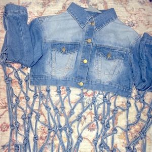 SOLD Crop Jean jacket with open slits on the side and fringe detail in the back
